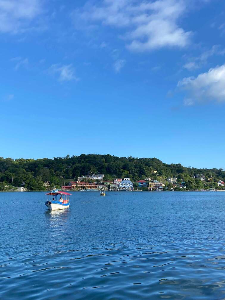 A boat floating in Lake Peten.